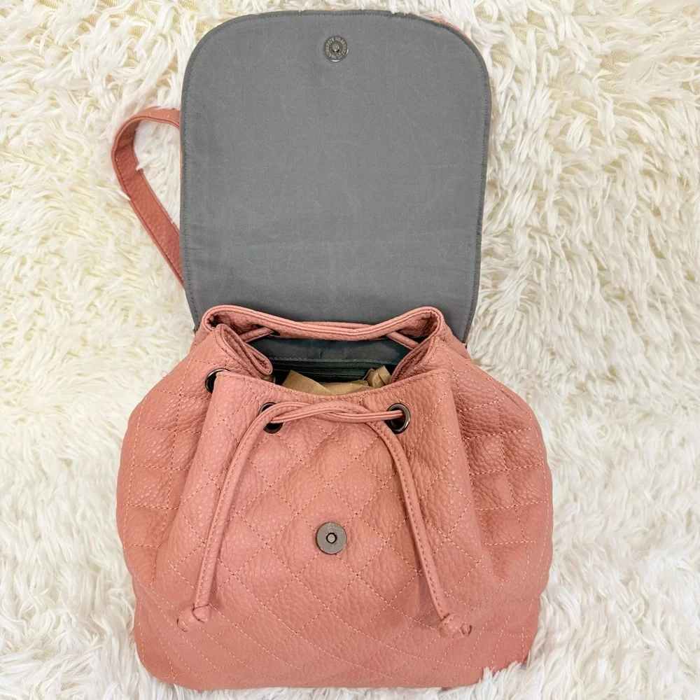 Daryll Quilted Faux leather drawstring bucket backpack purse blush|nude JustFab